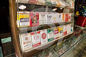 Thailand retro cigarettes package brand collection in a display glass cabinet.